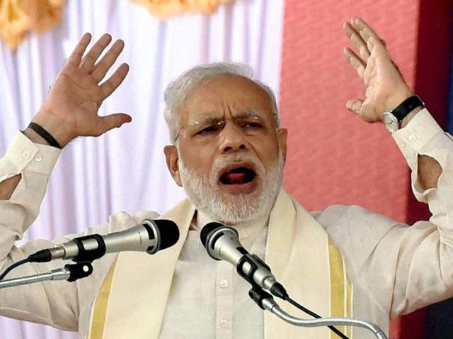 Prime Minister Narendra Modi addressing a public rally at the BJP National council meeting at Kozhikode on Saturday.(PTI)