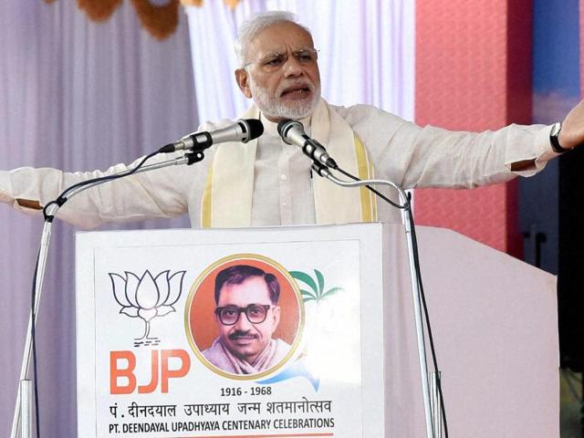 Prime Minister Narendra Modi addressing public rally at the BJP National council meeting at Kozhikode on Saturday.(PTI Photo)