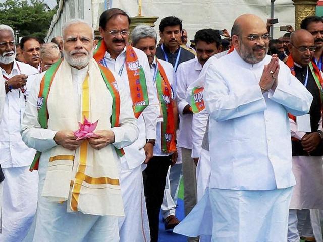 Prime Minister Narendra Modi and BJP president Amit Shah in Kozhikode on Sunday.(PTI Photo)