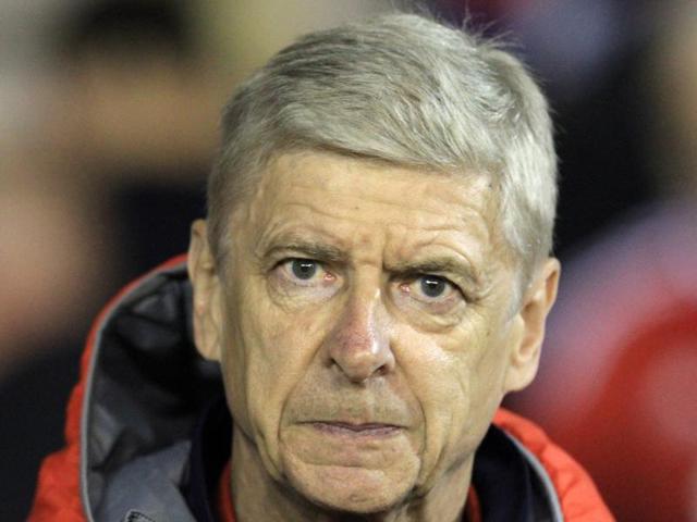 Arsenal's French manager Arsene Wenger arrives for the English League Cup third round football match between Nottingham Forest and Arsenal at The City Ground in Nottingham. (AFP Photo)