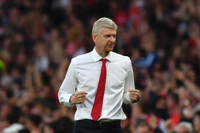 Arsenal's French manager Arsene Wenger celebrates after Arsenal scored their third goal during the English Premier League football match between Arsenal and Chelsea at the Emirates Stadium in London. (AFP) Arsenal's French manager Arsene Wenger celebrates after Arsenal scored their third goal during the English Premier League football match between Arsenal and Chelsea at the Emirates Stadium in London. (AFP)