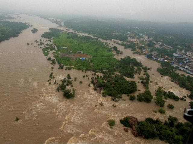 An aerial view of the flood hit Edupalaya village in Medak district of Telangana on September 25, 2016. IAF choppers rescued 23 people who were stranded (encircled in red). An aerial view of the flood hit Edupalaya village in Medak district of Telangana on September 25, 2016. IAF choppers rescued 23 people who were stranded (encircled in red).