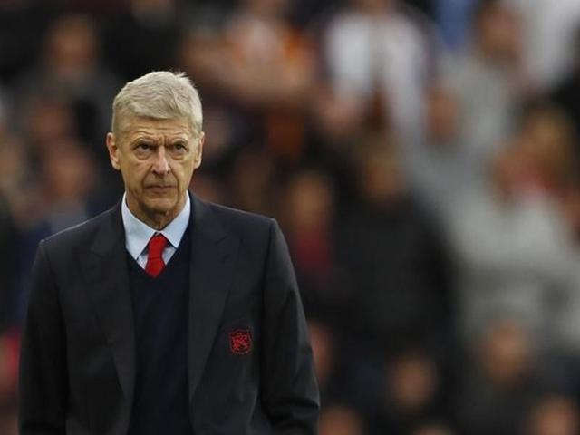 Arsene Wenger reacts during the match against Hull City at the Kingston Communications Stadium. (Reuters Photo)