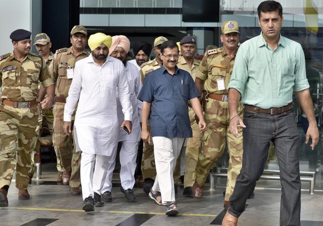 Delhi CM and AAP National Convener Arvind Kejriwal along with Sangrur MP Bhagwant Mann coming out from the Amritsar International Airport on Sunday. (Gurpreet Singh/Hindustan Times)