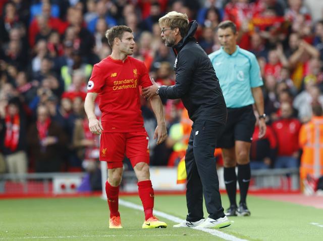 Liverpool manager Juergen Klopp talks to James Milner. (REUTERS) Liverpool manager Juergen Klopp talks to James Milner. (REUTERS)