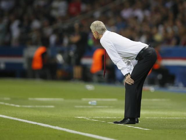 Wenger looks on during the Uefa Champions League match against PSG at Parc des Princes stadium in Paris. (Reuters Photo)