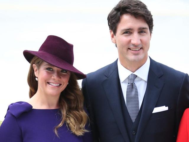 He posed with his wife Sophie Gregorire, both giving the royals a tough competition. (AFP) He posed with his wife Sophie Gregorire, both giving the royals a tough competition. (AFP)