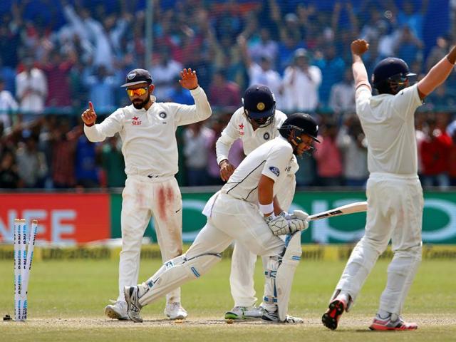 India's Virat Kohli (L) celebrates with teammates after winning the match. (REUTERS)