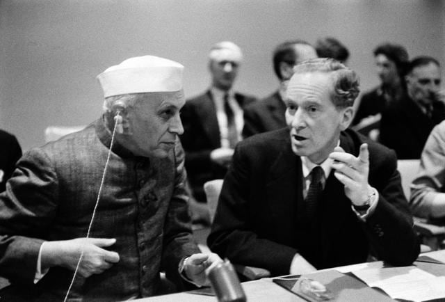 During his visit to the UN headquarters, then prime minister Jawaharlal Nehru met with representatives of the Commonwealth group of nations. In the photo above, Nehru listens to Sir Pierson Dixon, the United Kingdom’s Permanent Representative to the UN on December 21, 1956. ( UN Photo/AF ) During his visit to the UN headquarters, then prime minister Jawaharlal Nehru met with representatives of the Commonwealth group of nations. In the photo above, Nehru listens to Sir Pierson Dixon, the United Kingdom’s Permanent Representative to the UN on December 21, 1956. ( UN Photo/AF )