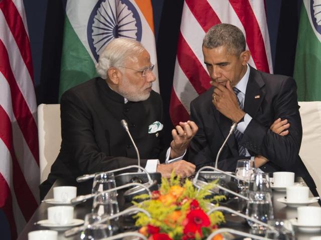 US President Barack Obama (R) talks with Prime Minister Narendra Modi during a meeting at the UN conference on climate change COP21 on November 30,(AFP)