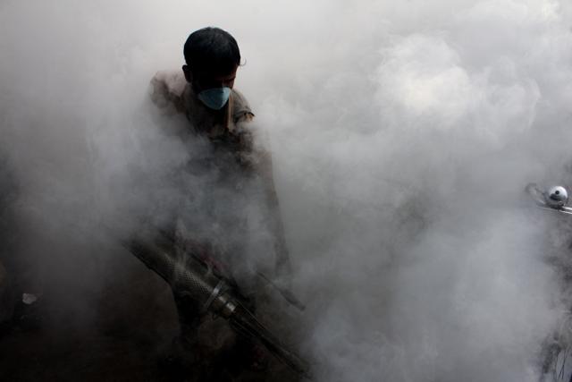 BMC smoke in slums for dengue at Ghatkopar, Mumbai. (Photo By Praful Gangurde)