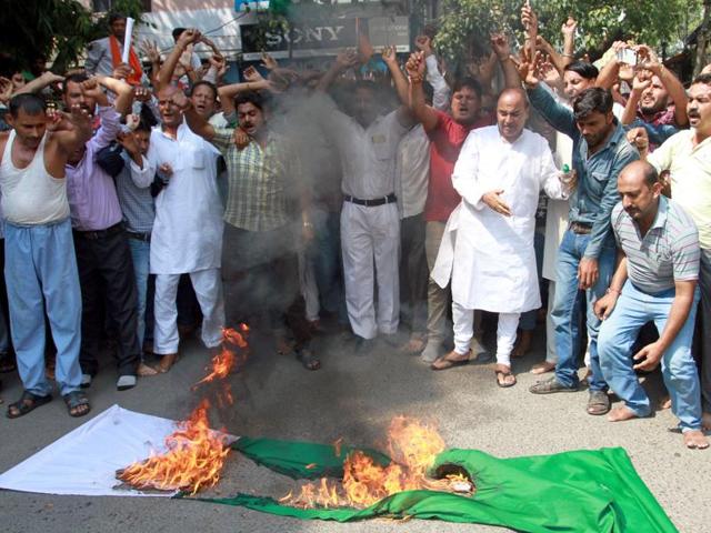 Shiv Sena activists burn Pakistan’s flag during a protest against the Uri terror attack. (Nitin Kanotra/ HT FIle Photo) Shiv Sena activists burn Pakistan’s flag during a protest against the Uri terror attack. (Nitin Kanotra/ HT FIle Photo)