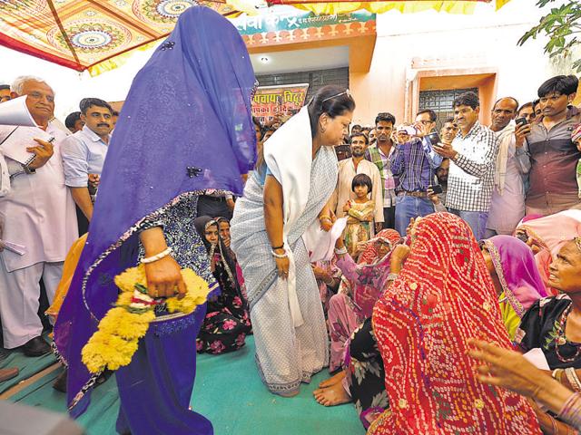 Rajasthan chief minister Vasundhara Raje in Bithur. The women of this village took up the challenge that the men wouldn’t — to bring down power losses.(HT file)