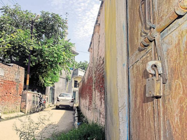 The locked house of a Muslim family that left Kutba.(Chahatram/ HT)