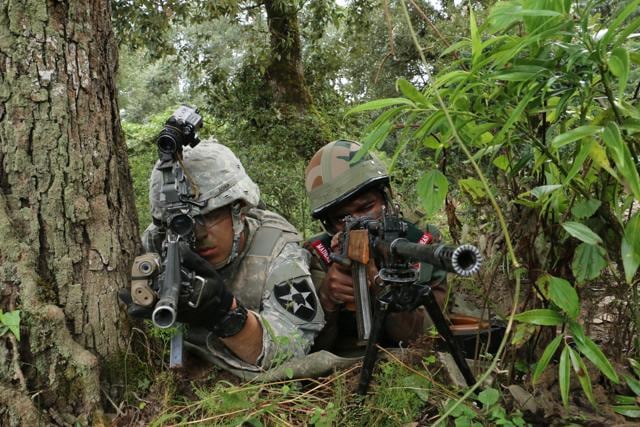 US, Indian army men preparing to shoot a target at a distance. (Rajeev Kala)