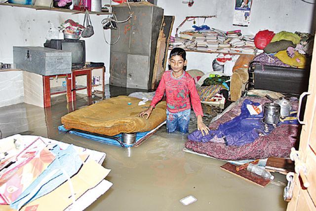 Water inside a home at Miyapur in the outskirts of Hyderabad. (Grist media) Water inside a home at Miyapur in the outskirts of Hyderabad. (Grist media)