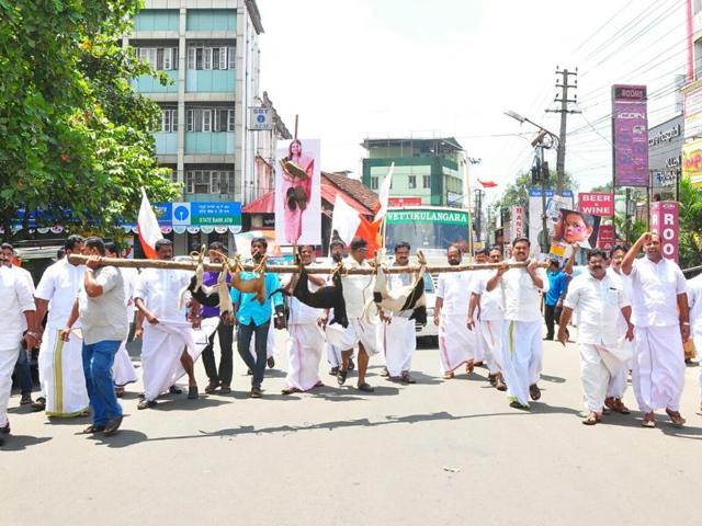 Youth Front (Mani) party workers killed 10 dogs and paraded their carcasses on the streets of Kottayam on Monday.(HT Photo)