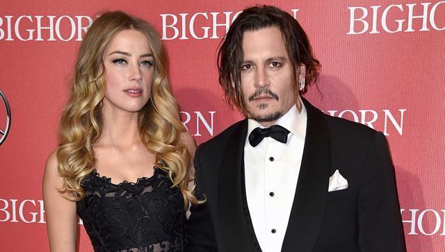 In this Jan. 2, 2016 file photo, Amber Heard, left, and Johnny Depp arrive at the 27th annual Palm Springs International Film Festival Awards Gala in Palm Springs, Calif. (AP) In this Jan. 2, 2016 file photo, Amber Heard, left, and Johnny Depp arrive at the 27th annual Palm Springs International Film Festival Awards Gala in Palm Springs, Calif. (AP)