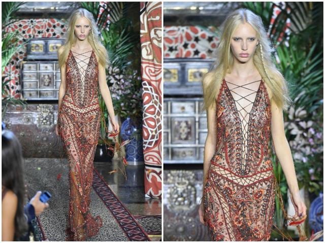 While the 1970s are a major theme this season, Roberto Cavalli maintains the spirit of the label and its signature codes, such as its famous taste for prints. (AFP) While the 1970s are a major theme this season, Roberto Cavalli maintains the spirit of the label and its signature codes, such as its famous taste for prints. (AFP)