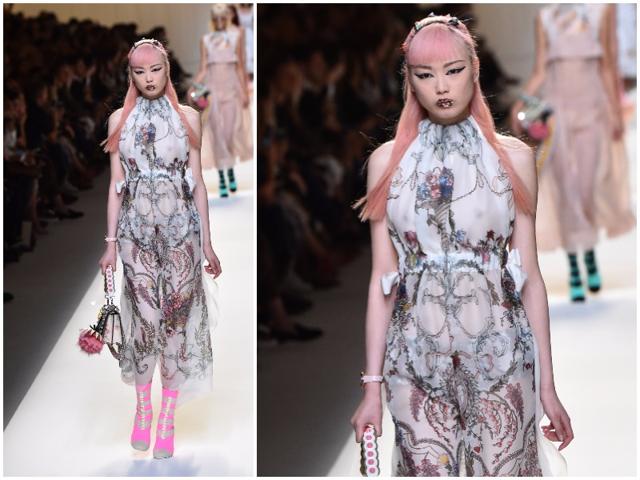 Dresses were big in the Fendi show, with apron dresses and shirt dresses, often sheer or embellished with embroidery. These were matched with brightly colored sandals. The label also went for striking make-up looks, with long strokes of eyeliner and glittery lips. (AFP) Dresses were big in the Fendi show, with apron dresses and shirt dresses, often sheer or embellished with embroidery. These were matched with brightly colored sandals. The label also went for striking make-up looks, with long strokes of eyeliner and glittery lips. (AFP)