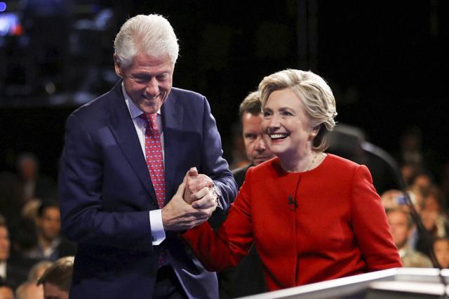 Democratic presidential nominee Hillary Clinton walks off the stage with her husband, former President Bill Clinton, after the presidential debate. (AP) Democratic presidential nominee Hillary Clinton walks off the stage with her husband, former President Bill Clinton, after the presidential debate. (AP)