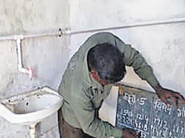 School officials say government sanctioned a building for them but the sarpanch got it constructed in another village to win their votes.(HT Photo)