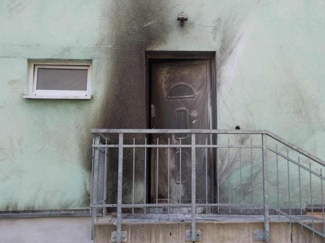 Traces of smoke can be seen after a bomb attack at the entrance to the Fatih Camii Mosque in Dresden, eastern Germany. (AFP Photo) Traces of smoke can be seen after a bomb attack at the entrance to the Fatih Camii Mosque in Dresden, eastern Germany. (AFP Photo)