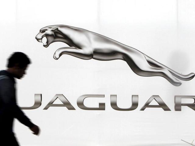 A man walks past a billboard advertising Jaguar in New Delhi.(Reuters) A man walks past a billboard advertising Jaguar in New Delhi.(Reuters)
