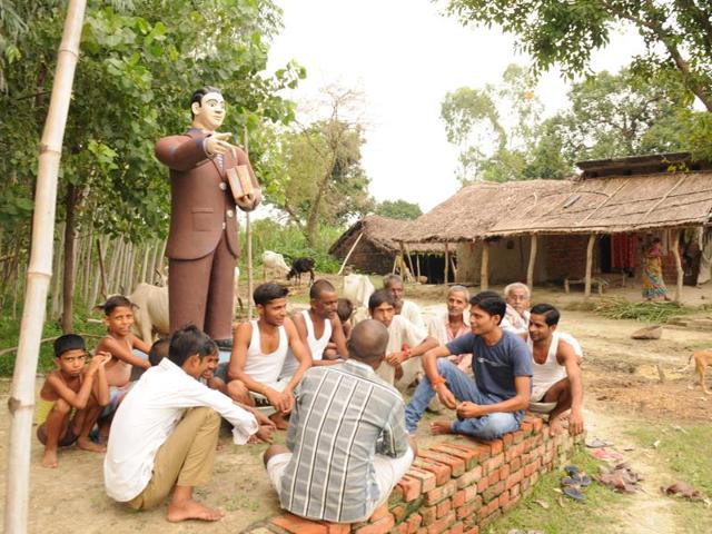 Dalits hold a panchayat meeting near an Ambedkar statue at Deokali village in UP’s Lakhimpur Kheri district.(Ashok Dutta/ HT Photo) Dalits hold a panchayat meeting near an Ambedkar statue at Deokali village in UP’s Lakhimpur Kheri district.(Ashok Dutta/ HT Photo)