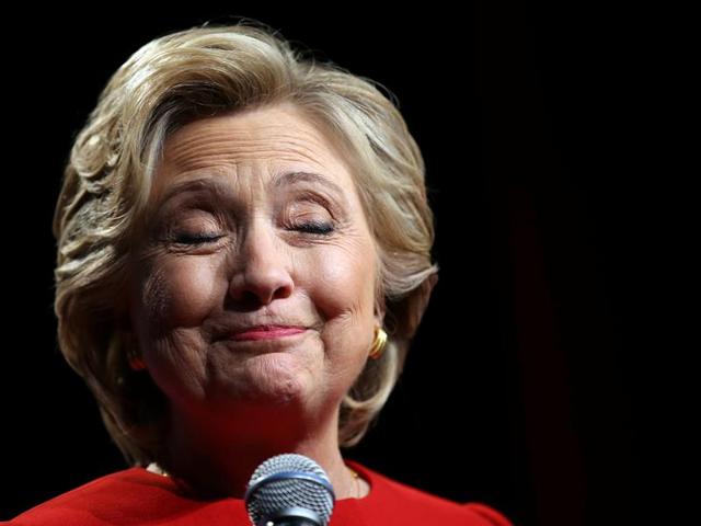 US Democratic presidential candidate Hillary Clinton pauses as she speaks with campaign supporters after the first presidential debate. (Reuters Photo)