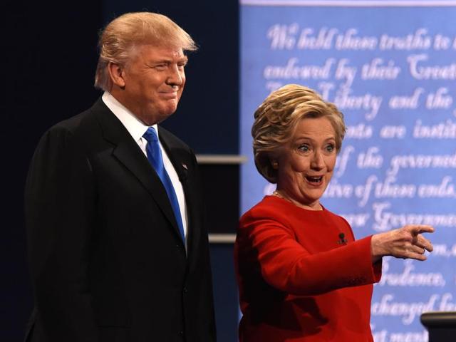 Democratic nominee Hillary Clinton (R) gestures next to Republican nominee Donald Trump during the first presidential debate at Hofstra University in Hempstead, New York on September 26.(AFP) Democratic nominee Hillary Clinton (R) gestures next to Republican nominee Donald Trump during the first presidential debate at Hofstra University in Hempstead, New York on September 26.(AFP)