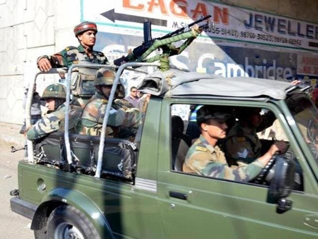Police men during a search operation in Pathankot on Tuesday after a high alert was sounded following inputs about suspicious movement of some people. (PTI) Police men during a search operation in Pathankot on Tuesday after a high alert was sounded following inputs about suspicious movement of some people. (PTI)