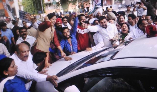 Workers gherao Sood’s car in Chandigarh on Wednesday. (Ravi Sharma/HT Photo)