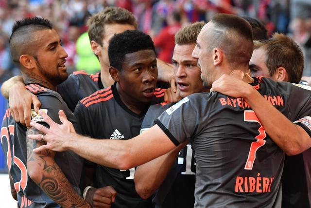 Bayern Munich's midfielder Joshua Kimmich (C) celebrates scoring with his teammates. (AFP Photo) Bayern Munich's midfielder Joshua Kimmich (C) celebrates scoring with his teammates. (AFP Photo)