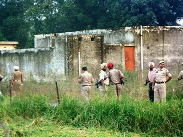 Police men during a search operation in Pathankot on Tuesday after a high alert was sounded following inputs about suspicious movement of some people.(PTI Photo)