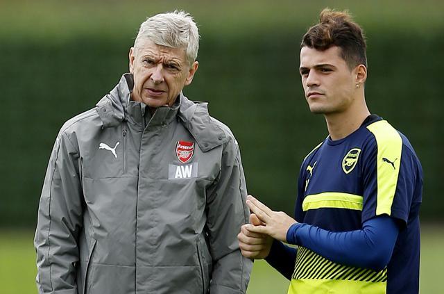 Arsenal manager Arsene Wenger and Granit Xhaka during training. (REUTERS) Arsenal manager Arsene Wenger and Granit Xhaka during training. (REUTERS)