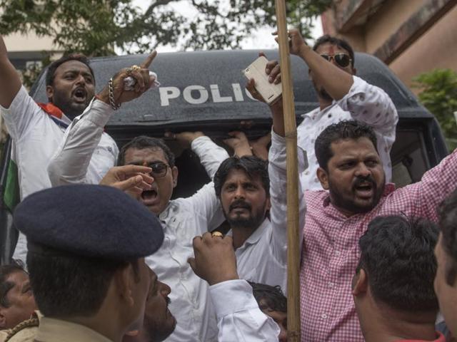 On Tuesday, the MNS workers launched an agitation outside film maker Karan Johar’s Andheri office as he had defended his casting of Fawad Khan in his movie and spoke against the ban.(Satish Bate/HT)