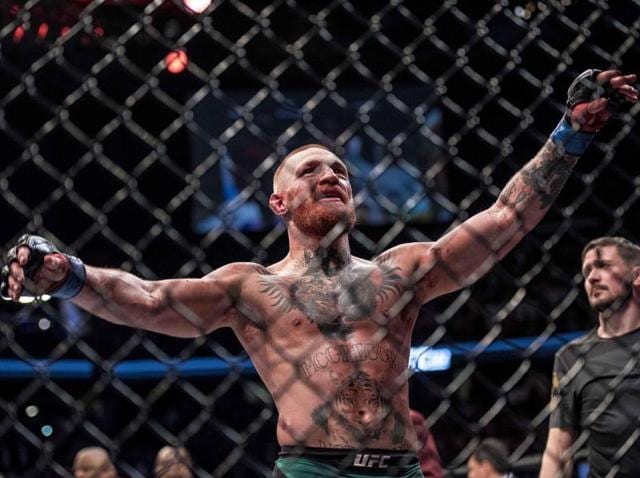 Conor McGregor (blue gloves) reacts to fight with Nate Diaz (red gloves) during UFC 202. (USA Today Sports) Conor McGregor (blue gloves) reacts to fight with Nate Diaz (red gloves) during UFC 202. (USA Today Sports)