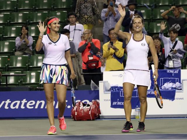 Sania Mirza, left, of India, and her partner Barbora Strycova, of the Czech Republic, at Wuhan Open.(AP Photo)