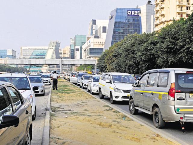 According to residents, taxi drivers have also taken over parking spaces in markets, forcing people to park their vehicles on the main roads.(Parveen Kumar/HT) According to residents, taxi drivers have also taken over parking spaces in markets, forcing people to park their vehicles on the main roads.(Parveen Kumar/HT)