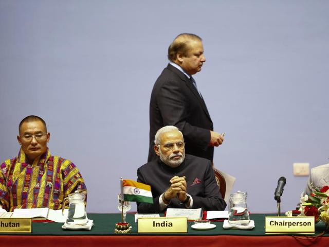 Bhutan's Prime Minister Tshering Tobgay (L), India's Prime Minister Narendra Modi (C), Pakistan's Prime Minister Nawaz Sharif (C, standing) and Nepal's Prime Minister Sushil Koirala attend the opening session of 18th South Asian Association for Regional Cooperation summit in Kathmandu on November 26, 2014.(REUTERS)