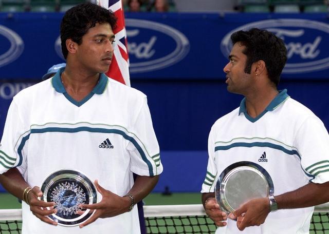 Men's doubles second-place winners Mahesh Bhupathi (L) and Leander Paes of India look at one another and hold their trophies during ceremonies at the Australian Open in Melbourne 30 January. (AFP) Men's doubles second-place winners Mahesh Bhupathi (L) and Leander Paes of India look at one another and hold their trophies during ceremonies at the Australian Open in Melbourne 30 January. (AFP)