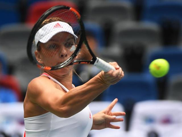 Simona Halep of Romania hits to Yaroslava Shvedova.(REUTERS) Simona Halep of Romania hits to Yaroslava Shvedova.(REUTERS)