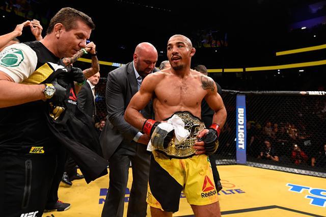 Jose Aldo of Brazil (center) reacts to his victory over Frankie Edgar in their UFC interim featherweight championship. (Zuffa LLC via Getty Images) Jose Aldo of Brazil (center) reacts to his victory over Frankie Edgar in their UFC interim featherweight championship. (Zuffa LLC via Getty Images)