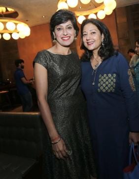 Anjum with Neelam Pratap Rudy, chairperson, sports committee of India, PHD. (Raajessh Kashyap/HT)
