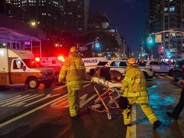 First responders work near the scene of an explosion in Manhattan’s Chelsea neighborhood, in New York on September 17, 2016 . Ahmad Rahami is suspected of carrying out the bombings.(AP) First responders work near the scene of an explosion in Manhattan’s Chelsea neighborhood, in New York on September 17, 2016 . Ahmad Rahami is suspected of carrying out the bombings.(AP)