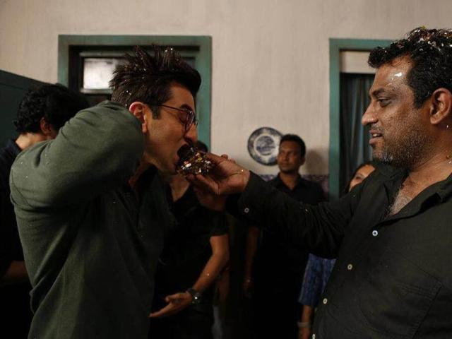 Anurag feeds cake to his actor and birthday boy Ranbir.