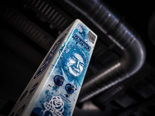 A creation entitled 'Spray on DUREX metal dispenser' by French artist C215 made from a condom dispensing machine and showing a portrait of former French Economy Minister Dominique Strauss Kahn, is displayed at the Street Art Museum, housed at the 'Ecole 42' computer programming school, in Paris on September 12, 2016.  (AFP) 