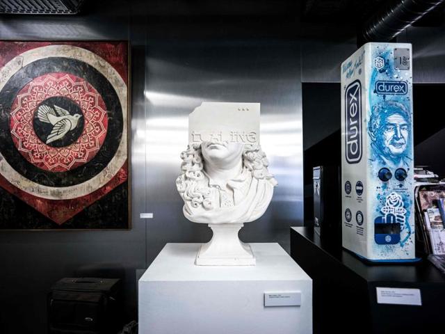 Pieces of street art (fromL) Doves (Black) by US artist Shepard Fairey, Loading... by French artist Rero and 'Spray on DUREX metal dispenser'. The first entrance free and permanent street art museum in France will open its doors to the public during the festival. (AFP) 