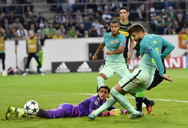 Gerard Pique scores the winner for Barcelona. (AP) Gerard Pique scores the winner for Barcelona. (AP)